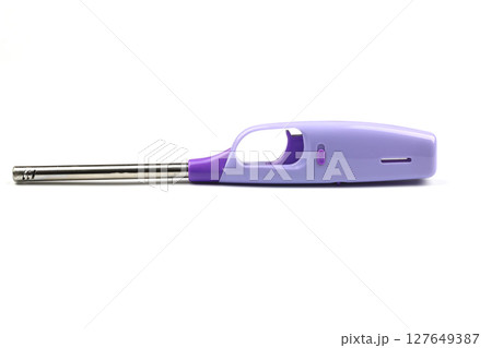 Clear dark blue cigarette lighter isolated on white background with clipping path. Cheap used disposable plastic gas lighter isolated. Close up shot of old lighter. High resolution macro shooting 127649387