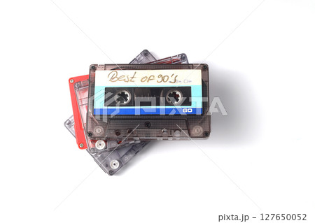 Retro audio cassette tape from the 80s and 90s on a white background. Retro audio cassette tape from the 80s and 90s on a white background. 127650052