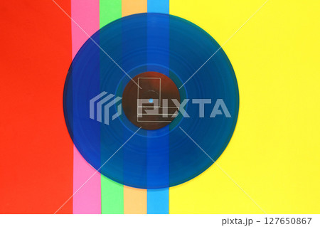 Blue Vinyl record on a colorful background. Retro style. Top view. 127650867