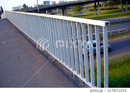 pedestrian bridge over the street balustrade 127651835