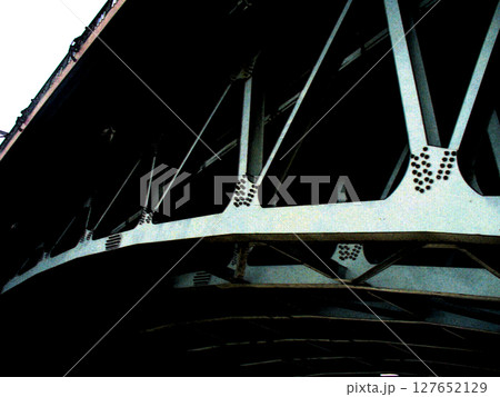 metal iron bridge construction over the river 127652129