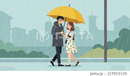 黄色の傘を差して雨の街を歩く明るいカップル 127653139