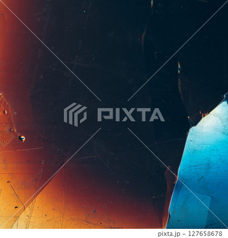 Broken texture. Defect glass. Blue orange dust scratches dirt stains old film noise weathered fractured effect on dark black grunge abstract background. Broken texture. Defect glass. Blue orange dust scratches dirt stains old film noise weathered fractured effect on dark black grunge abstract background. 127658678