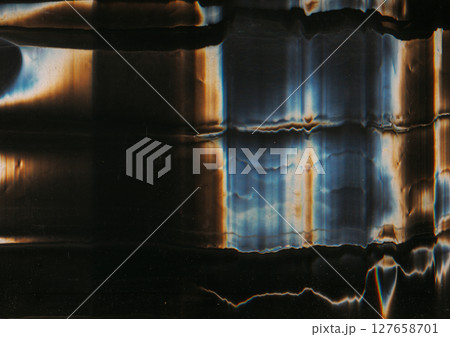 Color glitch noise. Screen texture overlay. Blue orange white glow artifacts old film dust scratches dirt on dark black abstract background. Color glitch noise. Screen texture overlay. Blue orange white glow artifacts old film dust scratches dirt on dark black abstract background. 127658701