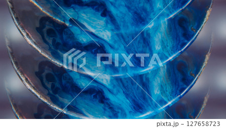 Optical effect paint. Art fluid blur. Blue black acrylic blend color. Defocused dye cascade dripping curve glow arch abstract gray background. 127658723