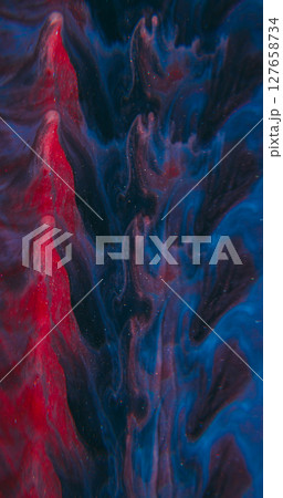 Fractal flow ink. Art fluid blur. Red blue black acrylic blend color. Sparkling dye particles defocused abstract kaleidoscopic wave background. 127658734
