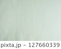 方眼紙のノート　薄い水色のグリッド入りのシンプルな背景素材 127660339
