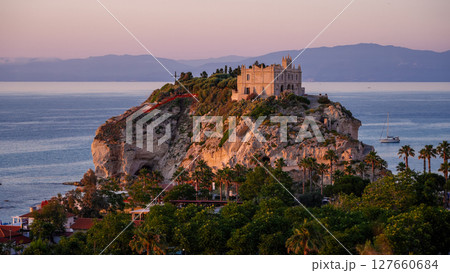 Sanctuary of Santa Maria dell Isola overlooking Tropea at sunset, Calabria, Italy Sanctuary of Santa Maria dell Isola overlooking Tropea at sunset, Calabria, Italy 127660684