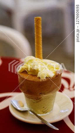 Enjoying a delicious Tartufo ice cream in Tropea, Italy 127660698