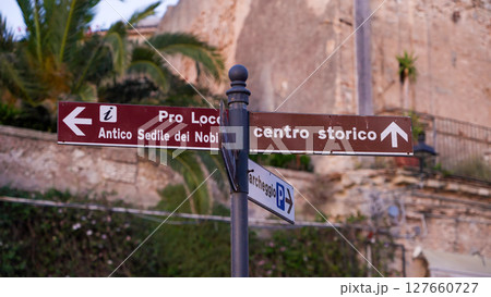 Street signs showing directions to different points of interest in Tropea, Italy 127660727
