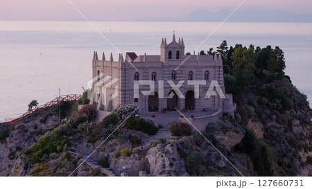 Santa Maria dell Isola sanctuary overlooking Tropea and Tyrrhenian Sea at dawn 127660731