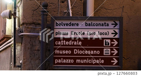 Tourist signs showing directions to points of interest in Tropea, Italy 127660803