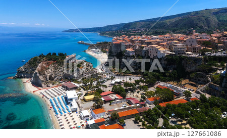 Tropea, Calabria, showing the Sanctuary of Santa Maria dell'Isola on a Cliff overlooking the Beach Tropea, Calabria, showing the Sanctuary of Santa Maria dell'Isola on a Cliff overlooking the Beach 127661086