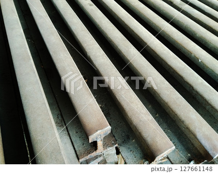 Railway track material steel image with selective focus Railway track material steel image with selective focus 127661148