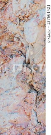 Surface of natural stone with rough texture eroded in high resolution. Surface of natural stone with rough texture eroded in high resolution. 127661421