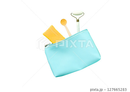 Beauty tools in a blue pouch, isolated on white, PNG 127665283