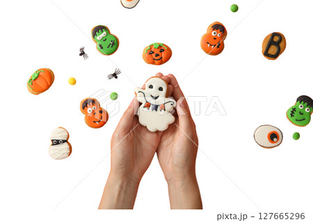 Hands hold a ghost cookie, isolated on white, PNG 127665296
