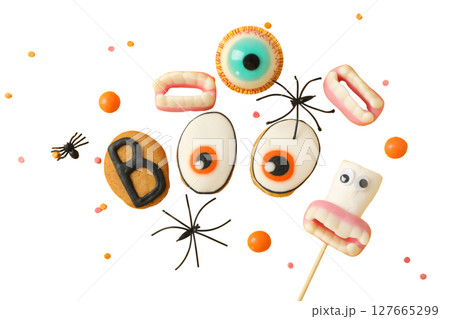 Spooky sweets for Halloween fun, isolated on white, PNG 127665299
