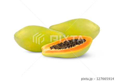 Green sweet ripe papaya fruit and a half isolated. Papaya fruits cut out. 127665914