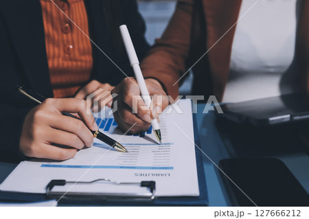 Business Documents, Auditor businesswoman checking searching document legal prepare paperwork or report for analysis TAX time,accountant Documents data contract partner deal in workplace office Business Documents, Auditor businesswoman checking searching document legal prepare paperwork or report for analysis TAX time,accountant Documents data contract partner deal in workplace office 127666212
