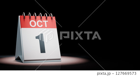 October 1 Calendar Spotlighted on Black Background 127669573