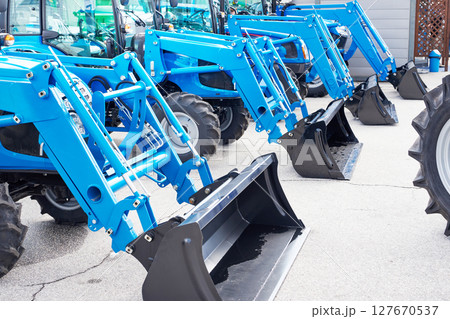 Tractor loader outdoors 127670537