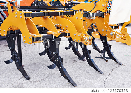 Universal agricultural cultivator at exhibition 127670538