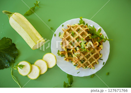 Waffles with green onions, zucchini and spices 127671766