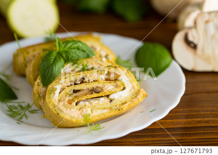 Summer vegetable zucchini roll with cheese 127671793