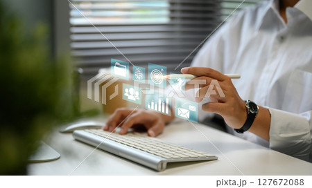 Businesswoman accessing virtual tools for global data and performance tracking Businesswoman accessing virtual tools for global data and performance tracking 127672088