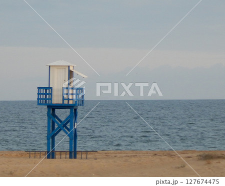 The blue lifeguard chair on a beach 127674475