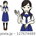 右手をあげて案内する女子高生 127674489