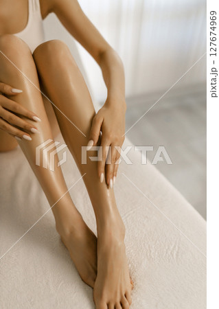 Wellness and beauty concept, beautiful slim woman in white underwear Wellness and beauty concept, beautiful slim woman in white underwear 127674969
