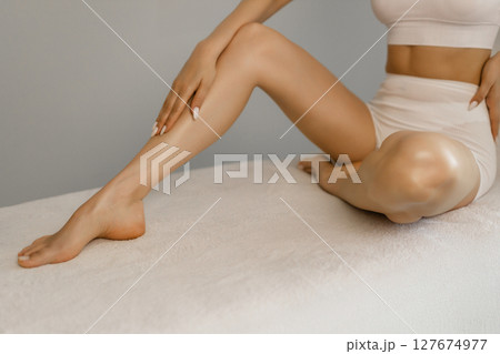 Wellness and beauty concept, beautiful slim woman in white underwear Wellness and beauty concept, beautiful slim woman in white underwear 127674977