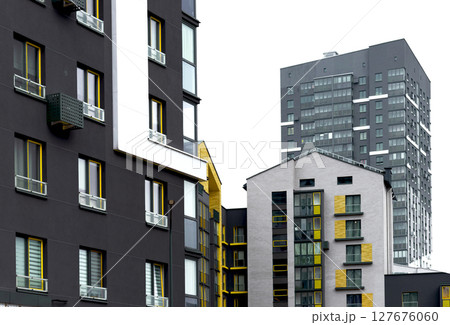 Buildings with modern architecture and colorful wood panel facades. High rise modular apartment Buildings with modern architecture and colorful wood panel facades. High rise modular apartment 127676060