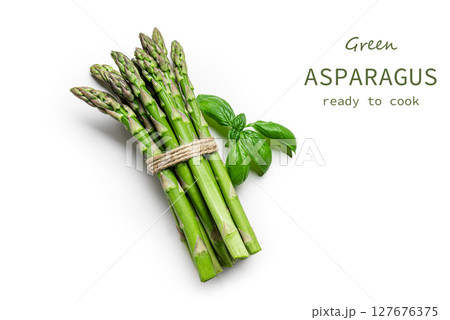 Fresh green asparagus isolated on white Fresh green asparagus isolated on white 127676375