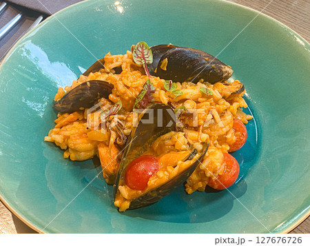 Traditional Portuguese Paella with Seafood and Local Ingredients. 127676726