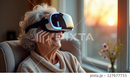 Elderly woman with VR headset 127677733