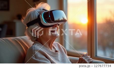 Elderly woman with VR headset 127677734