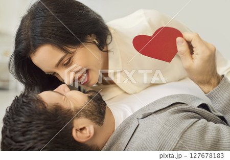 Close-Up Of Happy Married Couple Celebrating Valentine Day Embracing Close-Up Of Happy Married Couple Celebrating Valentine Day Embracing 127678183