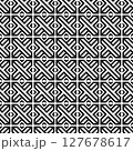 Seamless abstract geometric black and white pattern with interlocking lines and diagonal stripe elements 127678617