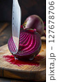 Transparent beetroot, cut in half, like a crystal with a faceted surface, 127678706