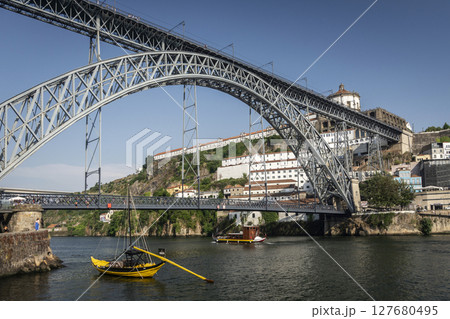 Dom Luis I bridge iconic landmark and riverside in Porto Portugal Dom Luis I bridge iconic landmark and riverside in Porto Portugal 127680495