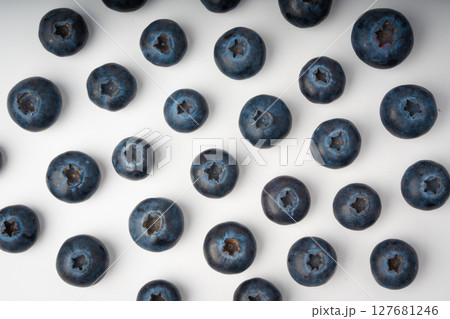 Blueberry texture background. Fresh blue berry fruits pattern, bilberry wallpaper with copy space 127681246