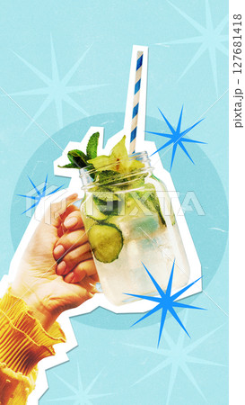 Hand holding refreshing mojito cutout with blue background and starburst accents for beverage Hand holding refreshing mojito cutout with blue background and starburst accents for beverage 127681418