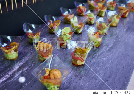 An Elegant Assortment of Gourmet Desserts and Savory Snacks Beautifully Arranged on Table An Elegant Assortment of Gourmet Desserts and Savory Snacks Beautifully Arranged on Table 127681427