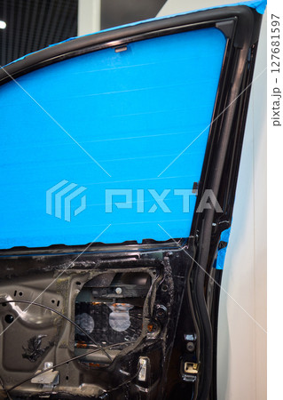 Hands Engaged in the Process of Performing Automotive Interior Repairs Effectively 127681597