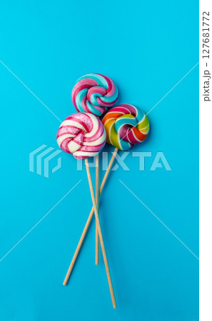 Color lollipop, spiral candy on stick, colorful striped lollypop, round fruit caramel, circle lollipop Color lollipop, spiral candy on stick, colorful striped lollypop, round fruit caramel, circle lollipop 127681772