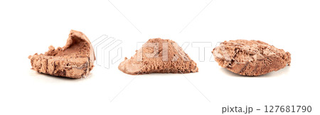 Melted chocolate ice cream isolated, real melting cocoa icecream drops, chocolate ice stain Melted chocolate ice cream isolated, real melting cocoa icecream drops, chocolate ice stain 127681790