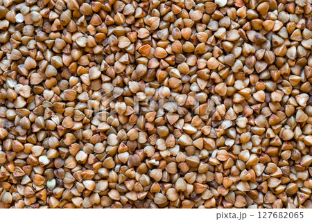 Brown and Close up Buckwheat Grains Background 127682065